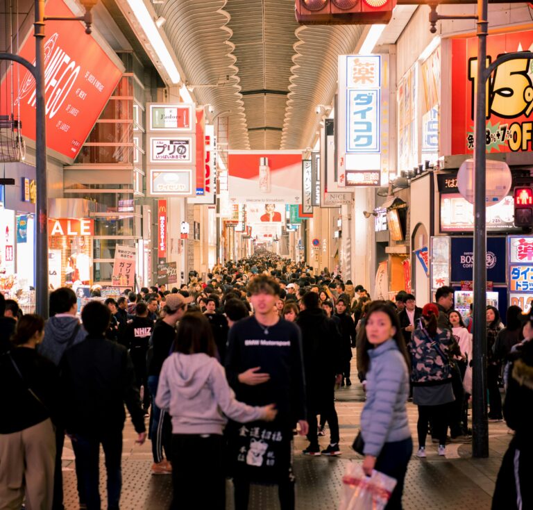 Crowd of People Walking Inside Store